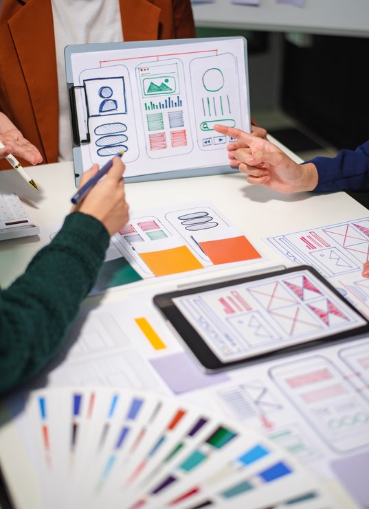 close-up-view-of-ui-developer-team-brainstorming-o-2025-07-06-09-01-23-utc