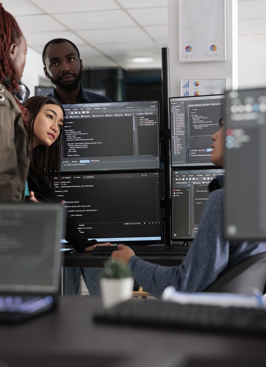multi-ethnic-engineers-analyzing-server-code-and-d-2025-02-19-16-26-33-utc