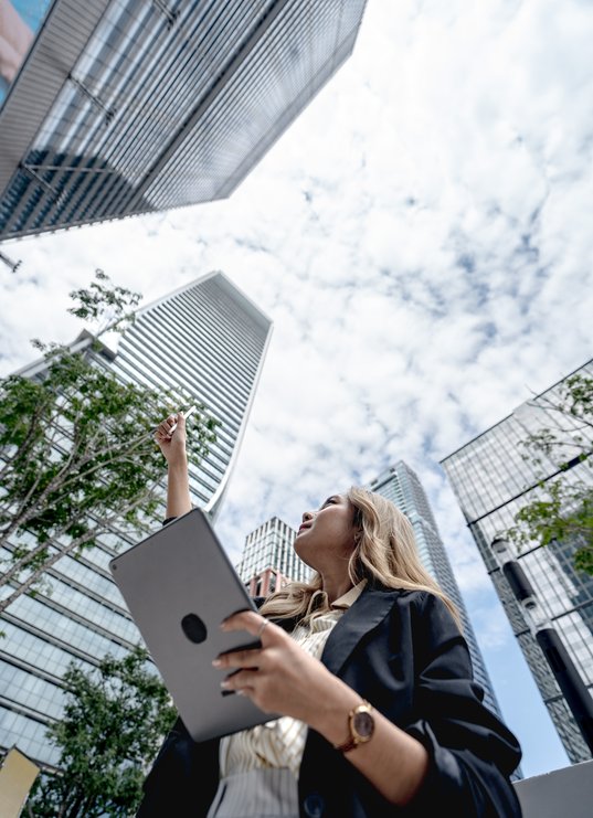 professional-woman-working-on-her-laptop-in-a-dyna-2025-07-09-11-22-01-utc