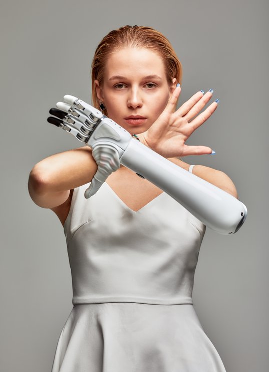 rear-view-of-female-office-worker-using-face-recog-2025-03-25-10-56-31-utc